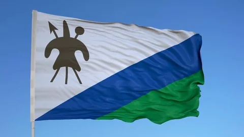 Looping flag for Lesotho on flag pole, blowing beautifully in the wind. Includes Stock-Footage 79765217