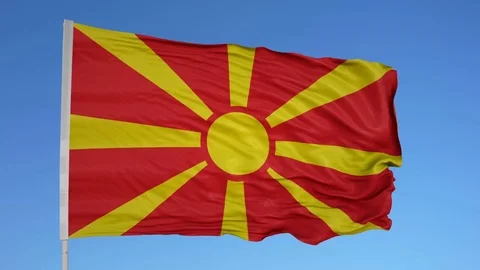 Looping flag for Macedonia on flag pole, blowing beautifully in the wind. Stock Footage 79770679