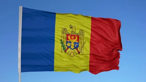 Looping flag for Moldova on flag pole, blowing beautifully in the wind. Includes Vídeo Stock 79775270