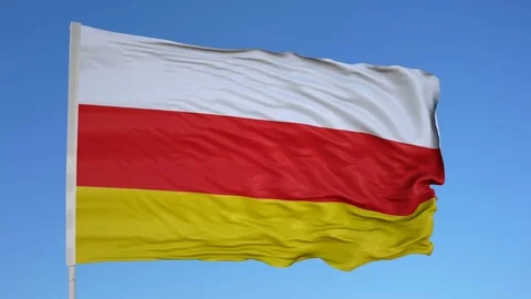 Looping flag for North Ossetia on flag pole, blowing beautifully in the wind. Stock-Footage 79792874