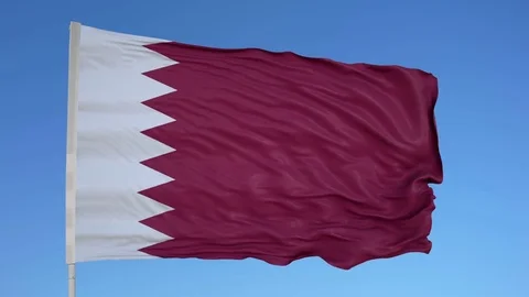 Looping flag for Qatar on flag pole, blowing beautifully in the wind. Includes 動画素材 79796345