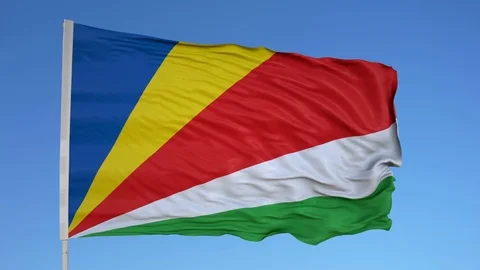Looping flag for Seychelles on flag pole, blowing beautifully in the wind. Video stock 79785730