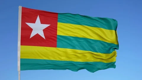 Looping flag for Togo on flag pole, blowing beautifully in the wind. Includes Stock Footage 79786478