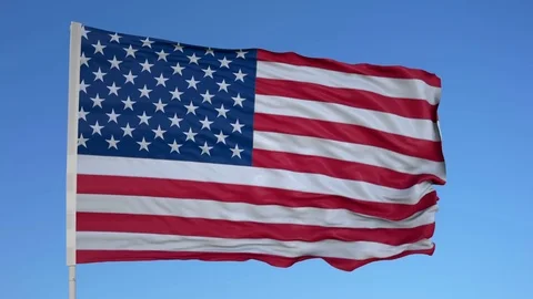 Looping flag for The United States on flag pole, blowing beautifully in the Stock Footage 79785438