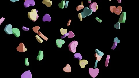 Looping isolated pastel heart candy with text falling on black Stock Footage 263146907