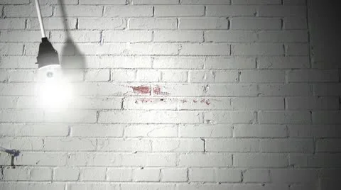 LOOPING Light bulb on white bricks  Видео 10161183