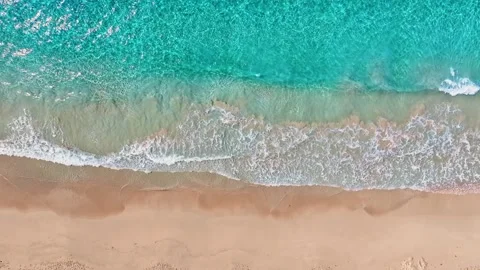 Looping ocean texture, aerial view of calmly moving ocean waves. Видео 330165972