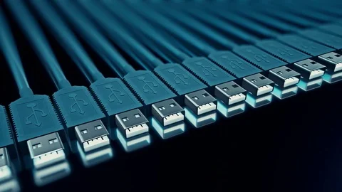 Looping Pan Over Cooly Lit Endless Line of USB-A Cables 库存影片 77904474