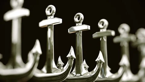 Looping Pan over an Endless Line of Chrome Anchors Stock Footage 77576173