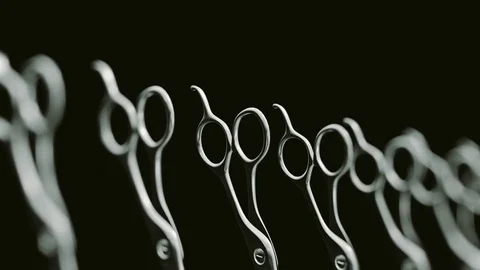 Looping Pan over an Endless Line of Barbers Scissors Stock Footage 77576309