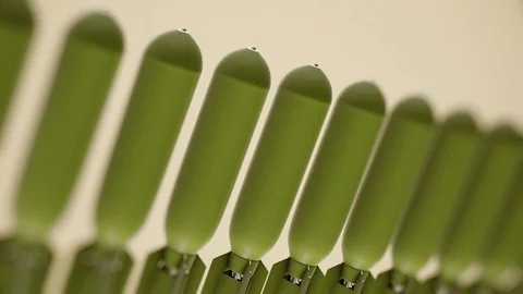 Looping Pan over an Endless Line of Bombs 库存影片 77577451