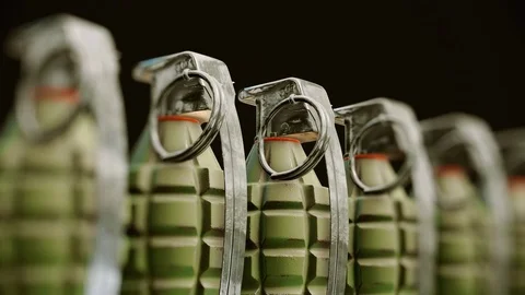 Looping Pan over an Endless Line of Grenades 库存影片 77583724