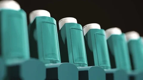 Looping Pan over an Endless Line of Inhalers Stock Footage 77583935