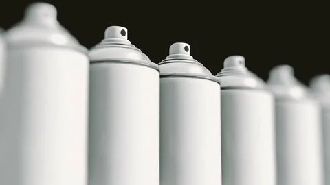 Looping Pan over an Endless Line of Blank Spray Cans 库存影片 77584261