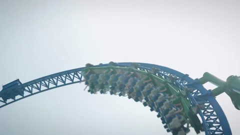 Looping rollercoaster ride. Rollercoaster upside down. People ride rollercoaster Stock Footage 196149905