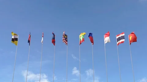 Looping video of ASEAN flag Waving on blue sky background Video stock 293439722