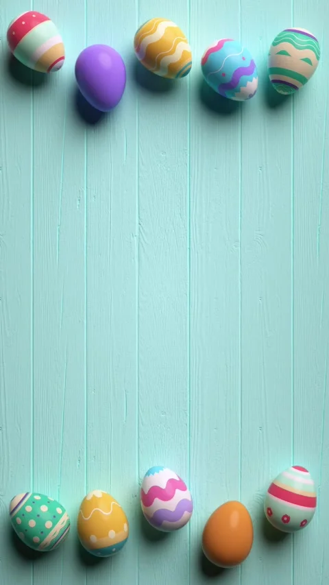 Looping video of painted easter eggs on a wooden blue table animated in sto.. Video stock 303635337