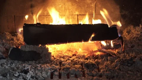 Looping video of wood burning inside a fireplace Stock Footage 114711863