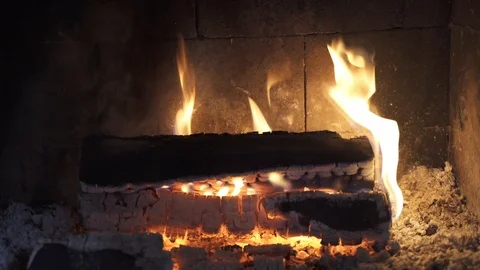 Looping video of wood burning inside a fireplace Stock Footage 114711880