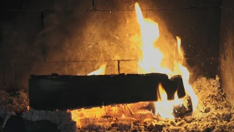 Looping video of wood burning inside a fireplace Stock Footage 114711909