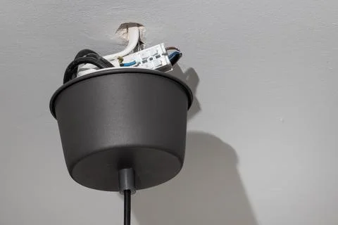 Loose Ceiling Lamp Canopy Cup and Exposed Wires Stock Photos