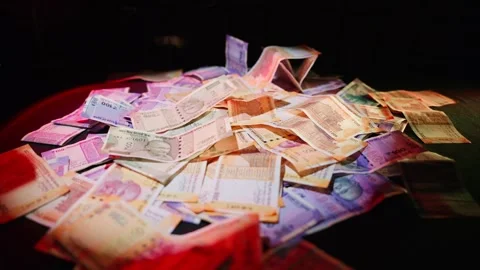Loose Currency Resting Over Dark Surface Stock Footage 313670750