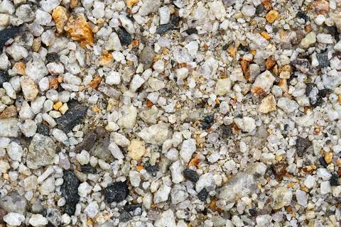 Loose, different shape and size stones textured background. Close up. Stock Photos