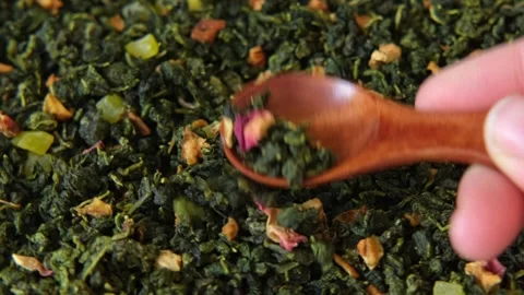 Loose Leaf Mango Pineapple Fruit Tea Wallpaper.  Dry Tea Leaves Stock Footage 245005629