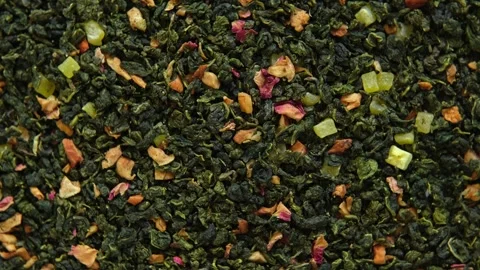 Loose Leaf Mango Pineapple Fruit Tea Wallpaper. Mix Black and Green Dry Tea Stock Footage 252804681