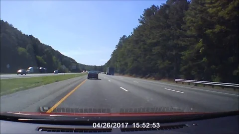Loose lorry tyre causes crash on US highway Stock Footage 109264712