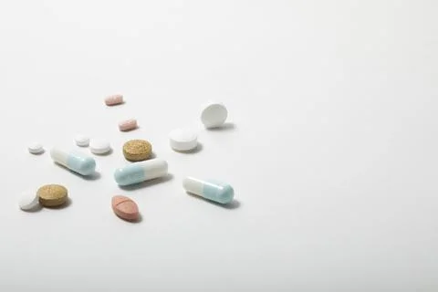 Loose multi coloured tablets Stock Photos