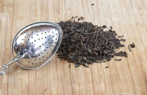 Loose Tea with Diffuser Spoon Stock Photos