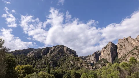 Lopable timelapse of clouds passing over montserrat in barcelona Stock Footage 160762283