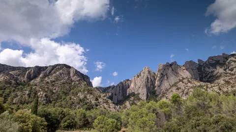 Lopable timelapse of clouds passing over montserrat in barcelona Stock Footage 160762637
