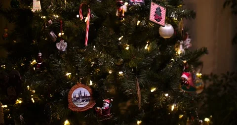 Lord of focus Christmas tree full of ornaments slider movement medium Stock Footage 220697904
