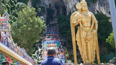 The Lord Murugan Statue outside of Batu Caves Stock Footage 124141350