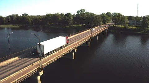 Lorries cross the bridge Stock Footage 113133548