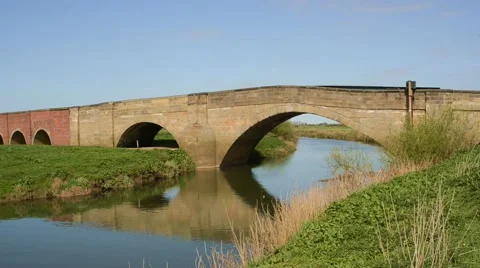 Lorries crossing the river derwent at bubwith yorkshire uk Stock Footage 49762751