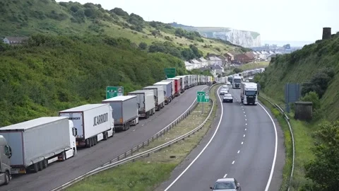 Lorries queue along the A20 in Kent as the Port of Dover experiences heavy traf Stock Footage 246585857