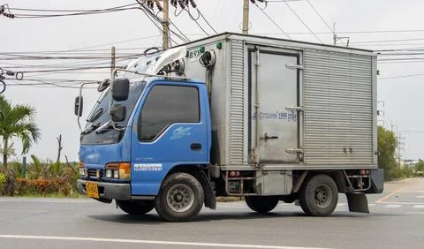 A lorry with closed loads space ride on a rural road Stock Photos