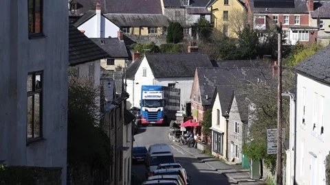 A lorry drives over the medieval bridge in Clun, Shropshire, UK. March 22 2024 Video stock 278514677