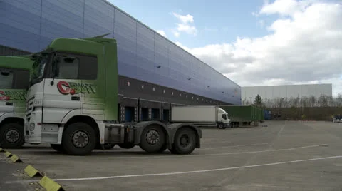 Lorry loading bays at distribution warehouse in England Stock Footage 25227693
