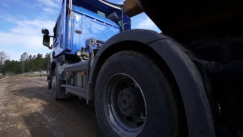 Lorry trucking load wheel close-up, truck transports oversized cargo Stock Footage 79654487