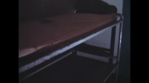 LOS ANGELES - 1968 - Panoramic views within a jail cell show the bunk bed and Stock Footage 338027030