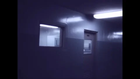 LOS ANGELES - 1968 - A prison cell block is mopped. Stock Footage 338027123