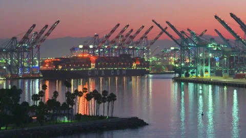LOS ANGELES, CA, USA - AUGUST 14, 2026: Container ship docked at marine terminal Stock Footage 342277394