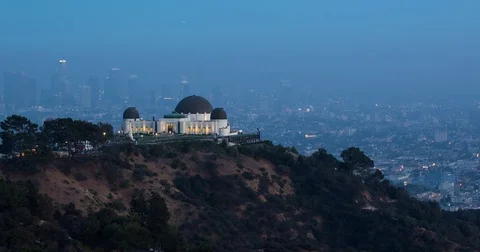 Los Angeles, CA, USA - Griffith Observatory at sunset - Timelapse pan left Stock Footage 75282223