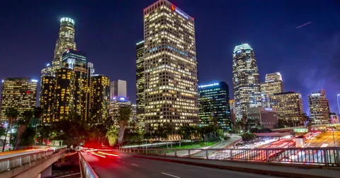 Los Angeles downtown skyline buildings highway timelapse time-lapse night Stock Footage