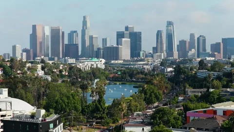 Los Angeles downtown skyline with Echo Park lake in foreground, modern office bu Stock Footage 336634465