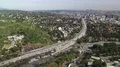 Los Angeles from Hollywood Hills Aerial Freeway Cityscape 4k or 4k+ Resolution